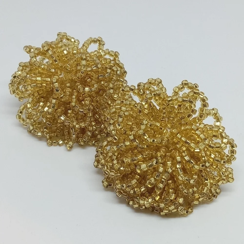 * vintage gold tone glass seed beads flower puff dramatic clip on earrings